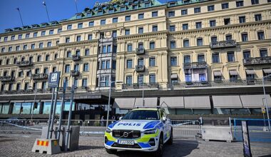 A Swedish police vehicle is parked outside the Grand Hotel during the Bilderberg meeting in Stockholm