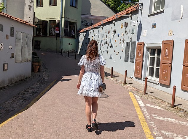 Known for its medieval old town that features cobblestone streets and Gothic architecture, Vilnius, Lithuania, feels safe for solo females and is pretty affordable, says Lydia (pictured)