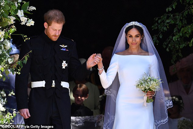The Duke and Duchess of Sussex emerge from St George Chapel in Windsor Castle after their wedding ceremony. The couple announced their engagement in November 2017 and were married on May 19, 2018