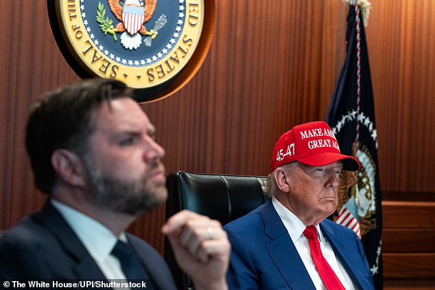 Donald Trump wears a MAGA cap as he sits in the Situation Room of the White House with VP JD Vance as US bombers executed strikes on Iran's nuclear infrastructure