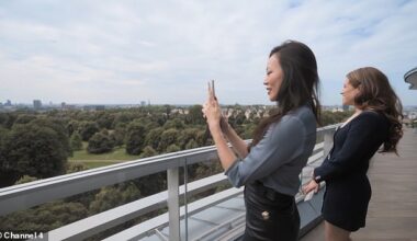 Dara Huang (left) photographs the view alongside real estate agent Constance Cunningham