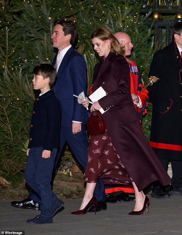 Beatrice and Edoardo Mapelli Mozzi with Wolfie at the carol service in December 2024