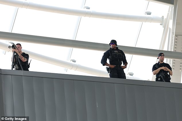 Three Secret Service agents were positioned on the roof of the stadium in Cincinnati, Ohio