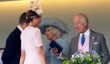 King Charles laughing talking to Harriet Sperling and Peter Phillips