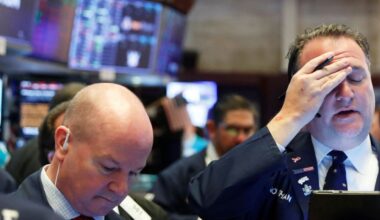 A trader reacts as he works on the floor of the New York Stock Exchange at the NYSE in New York, U.S., March 18, 2020. REUTERS/Lucas Jackson/ File Photo