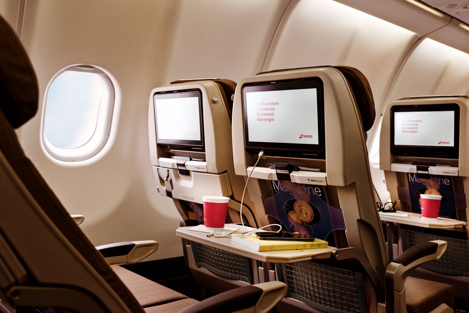 Image may contain Aircraft Airplane Transportation Vehicle Cup Computer Hardware Electronics Hardware and Monitor