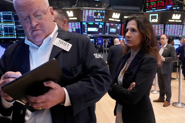 NYSE President Lynn Martin watches trading on the floor of the New York Stock Exchange in August. (AP Photo/Richard Drew)