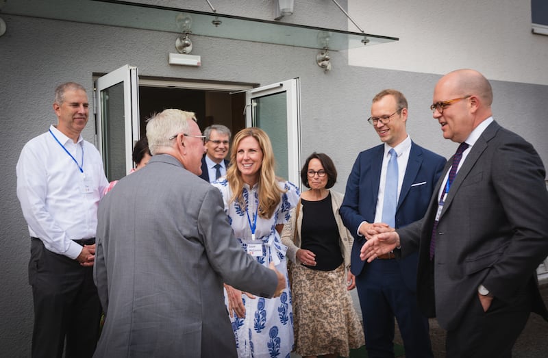 Cardinal Jean-Claude Hollerich, Archbishop of Luxembourg, is greeted at the door of the Church’s first meetinghouse in Luxembourg by Elder James W. McConkie III, a General Authority Seventy and second counselor in the Europe Central Area presidency, during an open house held June 14-15, 2025.