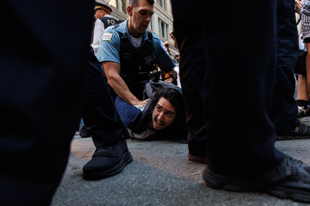 Protesters march against immigration crackdown