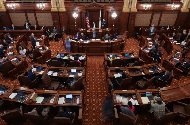 Members of the Senate discusses a bill prior to a vote at the Illinois State Capitol, May 29, 2025, in Springfield. (John J. Kim/Chicago Tribune)