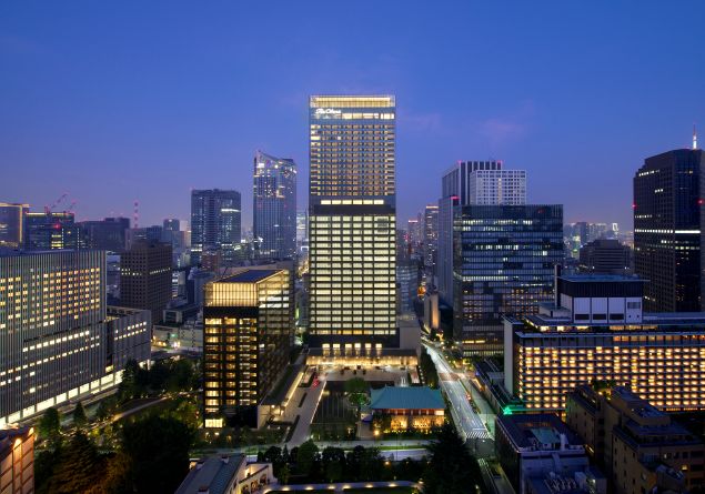 The Okura Tokyo’s illuminated exterior stands out against the night sky in Tokyo’s Toranomon district.

