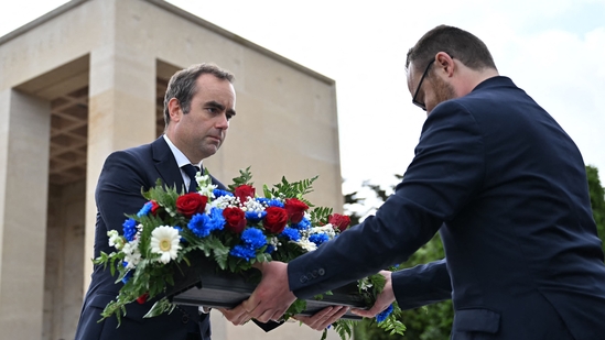 French Defence Minister Sébastien Lecornu laid a wreath at the American Cemetery in Colleville-sur-Mer on June 6, 2025, to mark the 81st anniversary of the D-Day landings. (Photo by Lou BENOIST / AFP)(AFP)