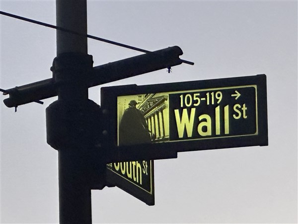Wall Street ticks closer to its record after Oracle rallies