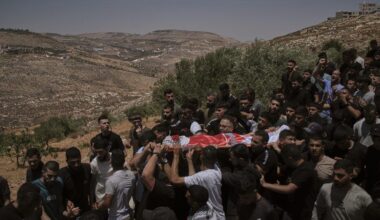 West Bank: Israeli settlers rampage at a military base | AP News