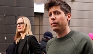 Sam Altman, chief executive officer of OpenAI, right, departs the New York Times DealBook Summit at Jazz at Lincoln Center in New York, US, on Wednesday, Dec. 4, 2024.
