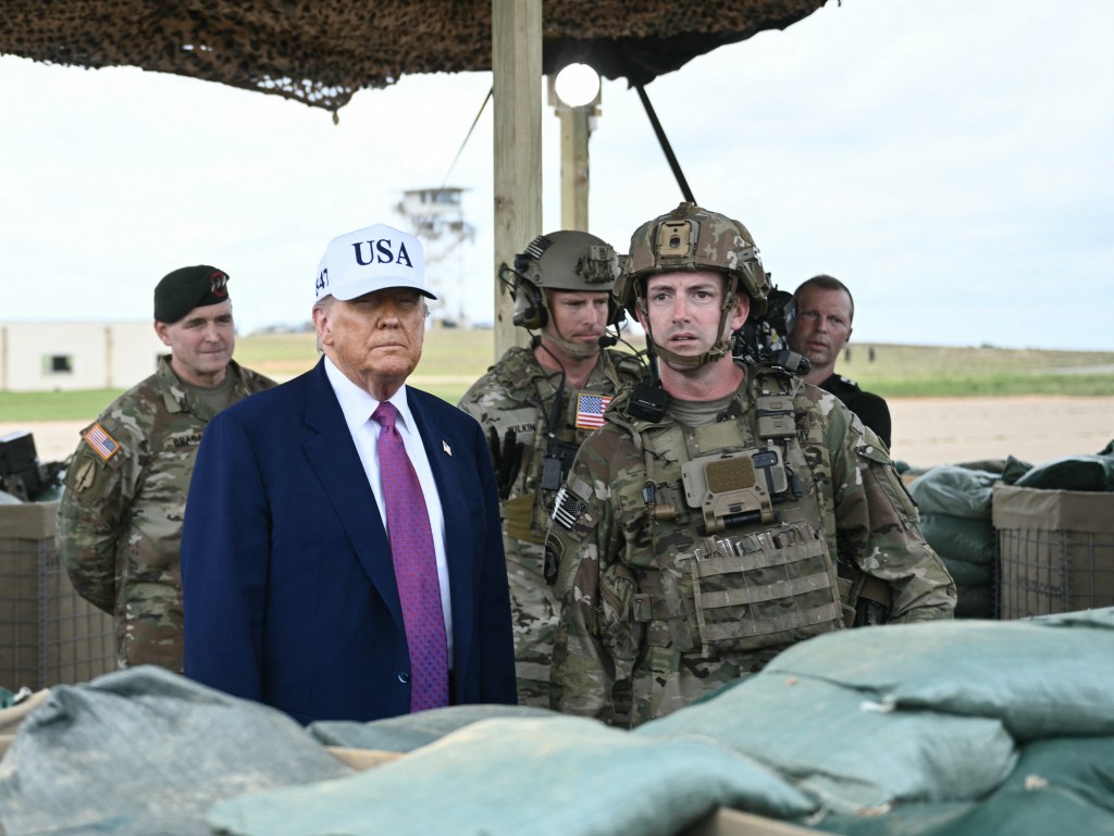 Trump warns protestors to face 'big force' at military parade