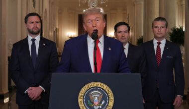 President Donald Trump, flanked, from left, by Vice President JD Vance, Secretary of State Marco Rubio and Defense Secretary Pete Hegseth, addresses the nation from the White House on Saturday. (Carlos Barria - Pool/Getty Images)