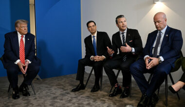 President Donald Trump listens as Defense Secretary Pete Hegseth, second from right, addresses reporters Wednesday at the NATO summit. Also pictured are Secretary of State Marco Rubio, second from left, and U.S. Ambassador to NATO Matthew Whitaker. (Brendan Smialowski/Pool/Getty Images)