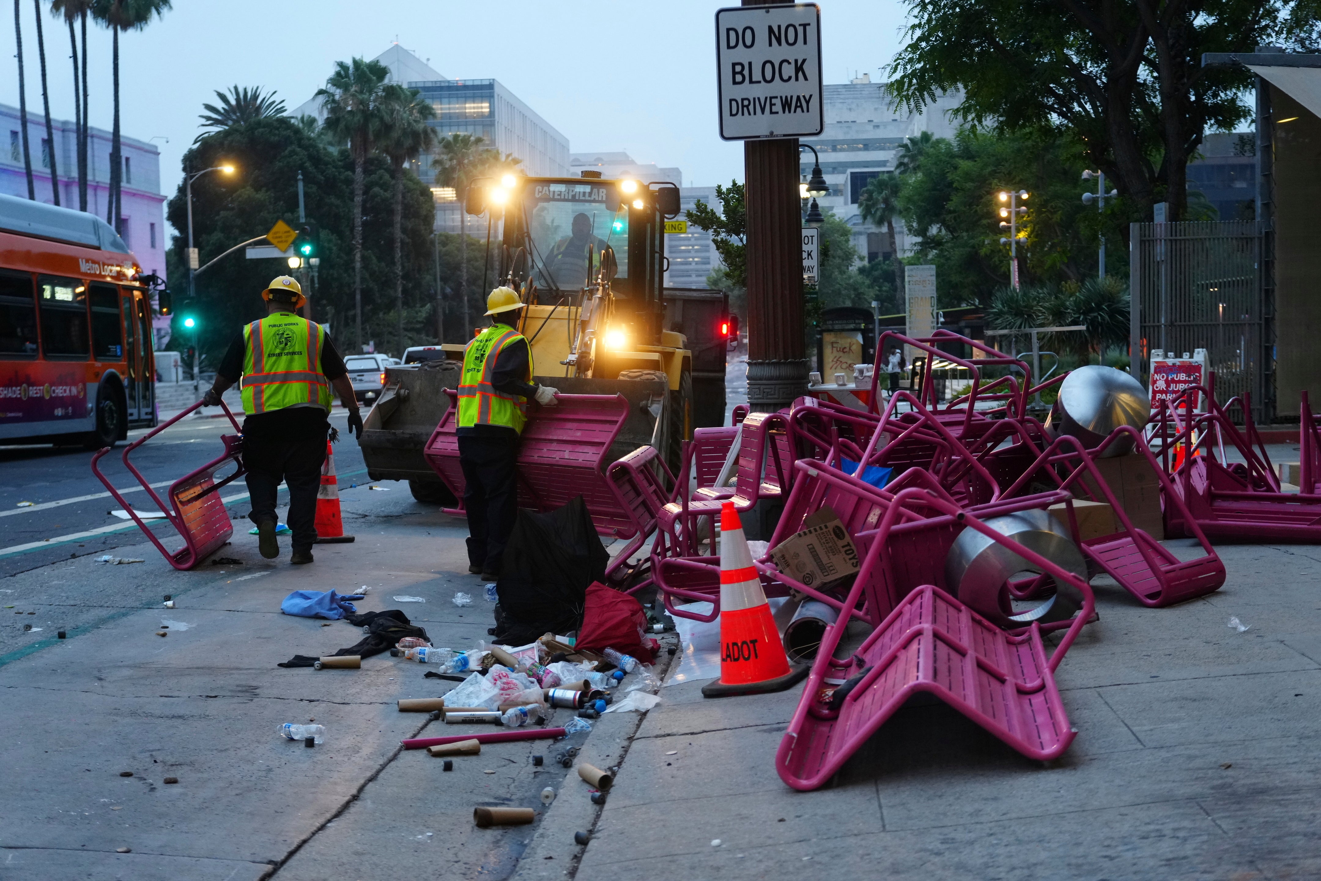 Public benches and chairs that protestors sheltered behind on Sunday litter the streets