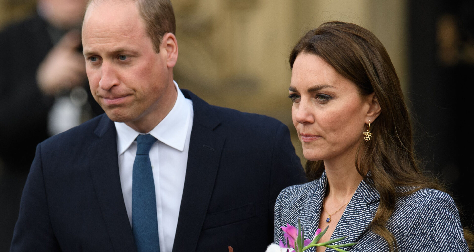 Prince William and Kate Middleton look somber