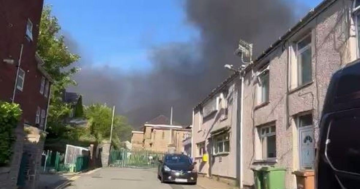 Multiple vehicles destroyed in fire which sent thick black smoke into skies above Abercarn