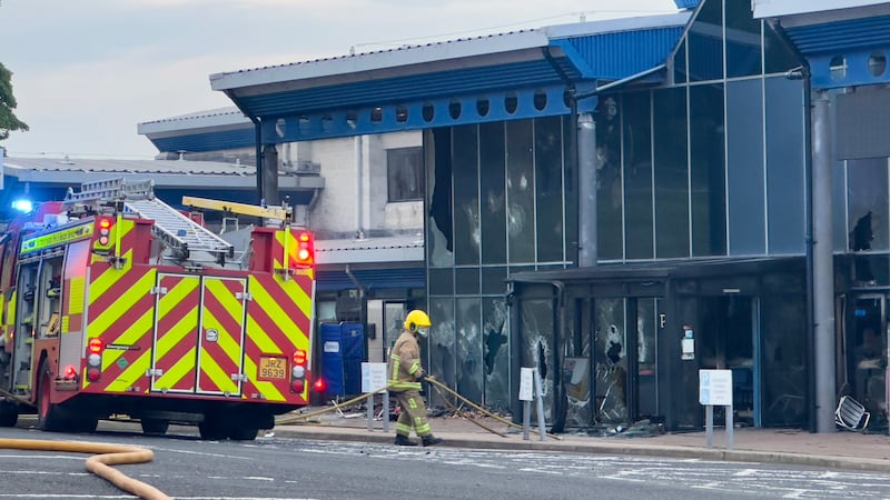 Fire fighters at the scene where a fire broke out at Larne Leisure Centre following vandalism at the facility. Photograph: Liam McBurney/ PA Wire