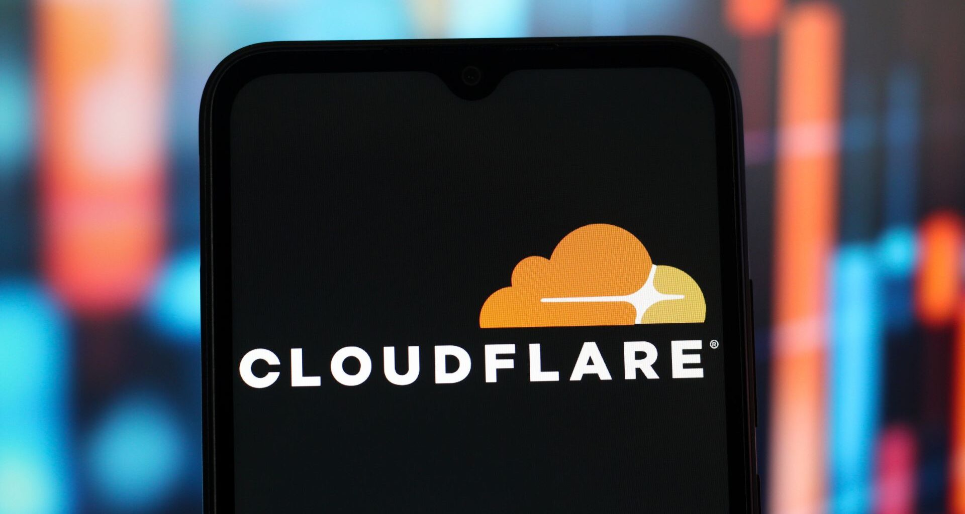 In this photo illustration, the Cloudflare logo is seen displayed on a smartphone screen.