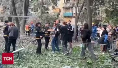 Parents of a young boy who was trapped under the residential building hit by a Russian Shahed, collapse as his body is pulled from the rubble - June 2025