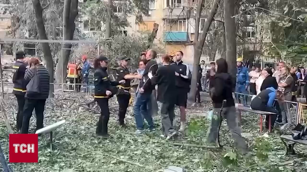 Parents of a young boy who was trapped under the residential building hit by a Russian Shahed, collapse as his body is pulled from the rubble - June 2025
