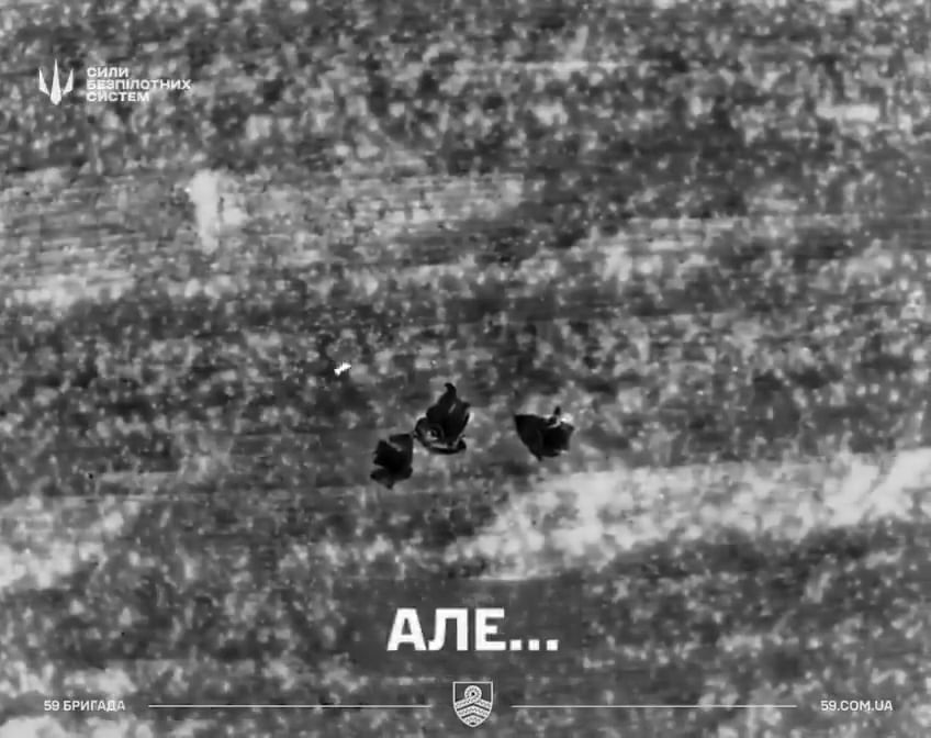 Ukrainian drone spots three Russian soldiers attempting to hide under anti-drone cloaks and drops munitions on them (Pokrovsk front)