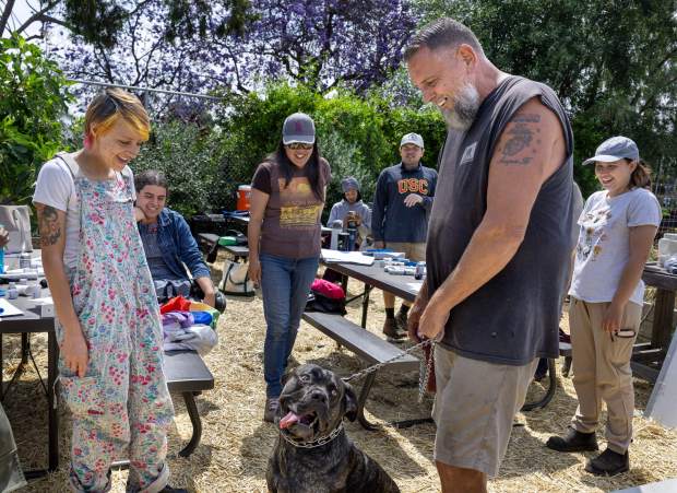 Shadow offers a break to students at Grow2Zero Farms where...