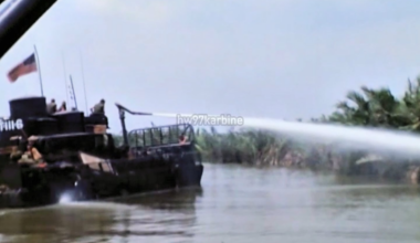 US Brown Water Navy "Douche Boat" experimentally fitted with high pressure water cannon to wash out Viet Cong bunkers and caches along the waterways of the Mekong Delta in 1969
