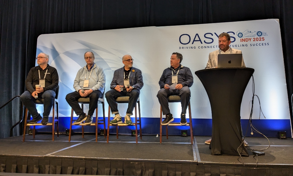 From left to right Jeff Costello of Nice, Dennis Holzer of Powerhouse Alliance, Mitch Klein of CEDIA, and Greg Simmons of ADI/SnapOne talk on tariff impacts at Oasys Buying group event