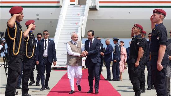 Prime Minister Narendra Modi being received by Cyprus President Nikos Christodoulides on his arrival at Larnaca International Airport, on Sunday. (DPR PMO)