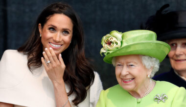 Meghan Markle wears a cream dress and attends a joint engagement with Queen Elizabeth, who wears a bright green coat, on June 14, 2018