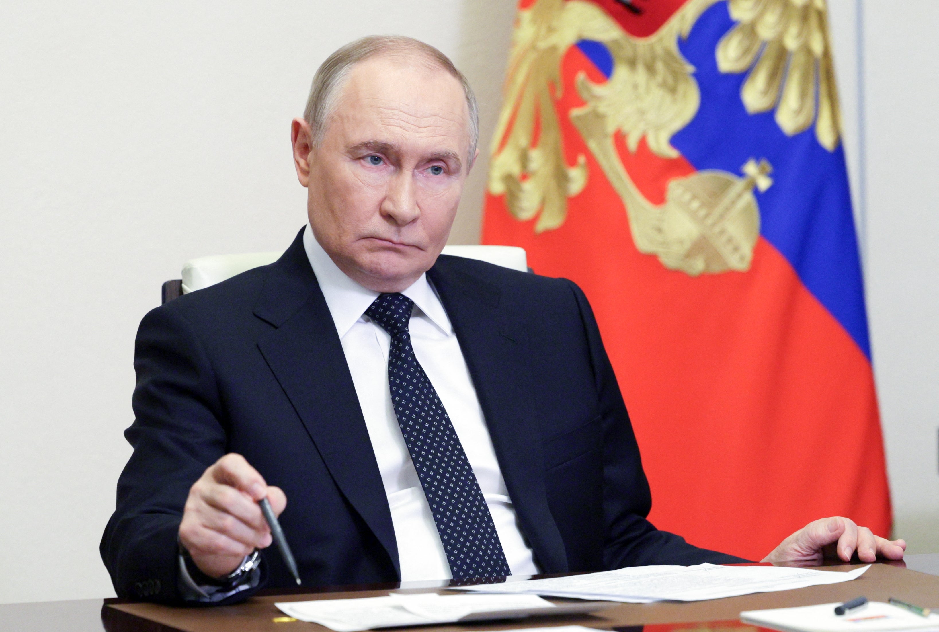 Russia's president Vladimir Putin chairs a meeting at the Novo-Ogaryovo state residence outside Moscow