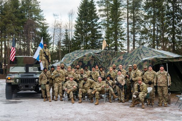 U.S. Army Capt. Imanic McCoy, an automated logistics officer with 589th Brigade Support Battalion, stands beside unit transportation equipment, providing support for 41st Field Artillery Brigade, prior to a location movement for exercise Dynamic Front 25 in Rovaniemi, Finland on November 14, 2024. Dynamic Front takes place from Nov 4-24 in Finland, Estonia, Germany, Poland, and Romania, and demonstrates NATO’s ability to share fire missions, target information, and operational graphics from the Arctic to the Black Sea. It increases the lethality of the Alliance through long-range fires, builds unit readiness in a complex joint, multi-national environment, and leverages host nation capabilities to increase USAREUR-AF’s operational reach. Dynamic Front includes more than 1,800 U.S. and 3,700 multi-national service members from 28 Allied and partner nations. (U.S. Army photo by Spc. Elijah Magaña)