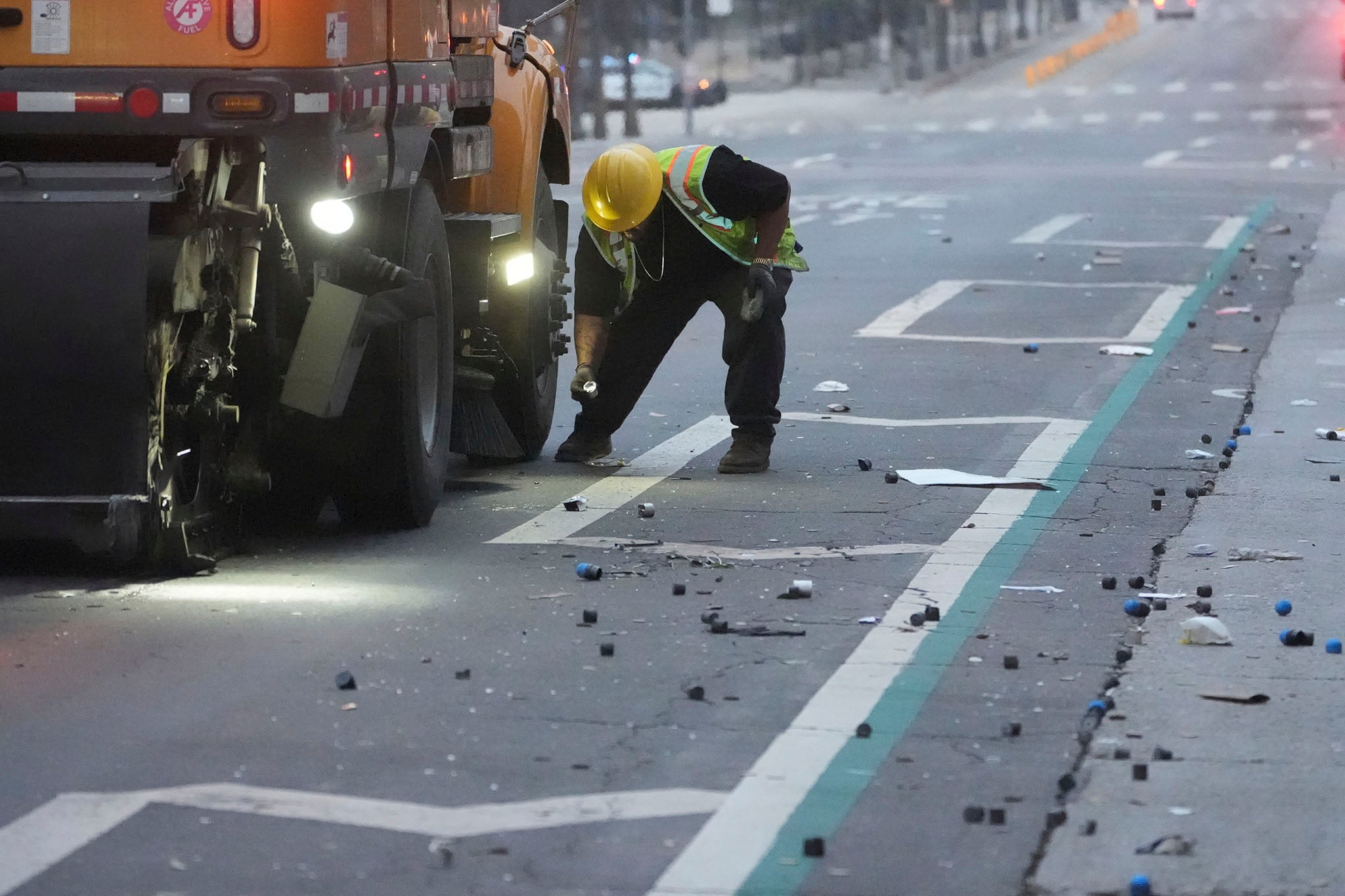 Dozens of the casings can be seen in the curbside gutters