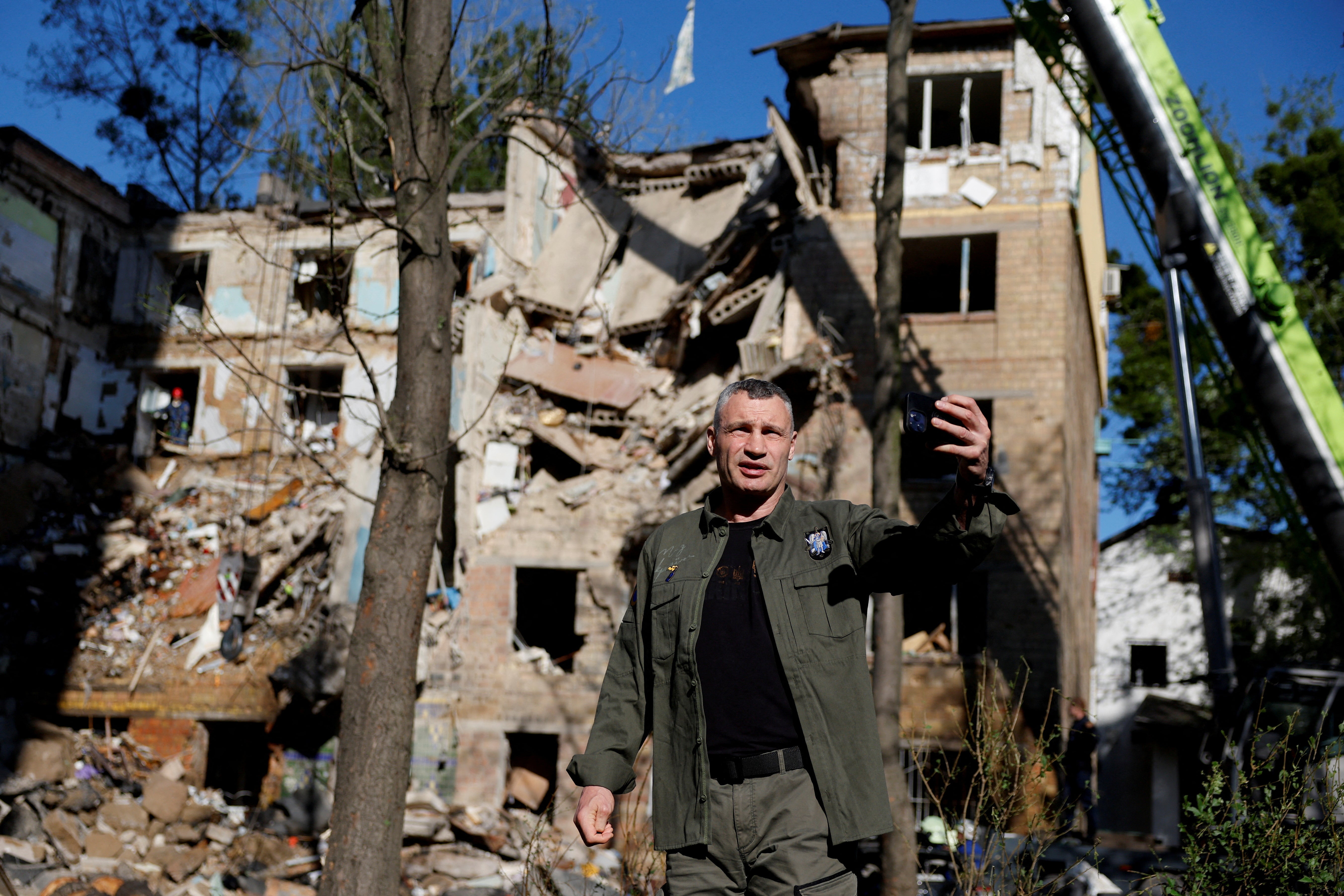 Kyiv Mayor Vitali Klitschko visits the site of an apartment building hit during Russian drone and missile strikes in Kyiv, Ukraine