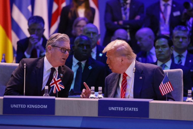 Britain's Prime Minister Keir Starmer (L) speaks with US President Donald Trump as they attend the North Atlantic Council plenary meeting at the North Atlantic Treaty Organisation (NATO) summit in The Hague on June 25, 2025. (Photo by Ludovic MARIN / POOL / AFP) (Photo by LUDOVIC MARIN/POOL/AFP via Getty Images)