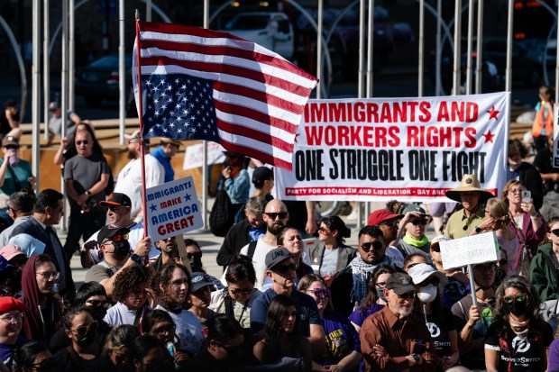 An upside-down American flag is seen as demonstrators, activists, and protesters gather and rally against Immigration and Customs Enforcement (ICE) outside of San Jose City Hall in San Jose, Calif., Monday, June 9, 2025. (Thien-An Truong for Bay Area News Group)