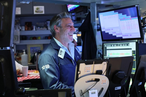 Traders work on the floor of the New York Stock Exchange during afternoon trading on April 09, 2025 in New York City. The three major indexes closed high after an upswing for biggest rally in 5 years caused after U.S. President Donald Trump announced a pause in some of the 'reciprocal' tariffs with the exception of China whose tariffs will be increased to 125% from 104% after China announced additional retaliatory tariffs. 10% universal tariff on all imports coming into the United States remain in effect. (Photo by Michael M. Santiago/Getty Images)