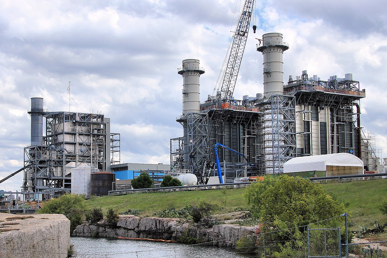 Natural gas power plant under construction on a river bank in Texas.