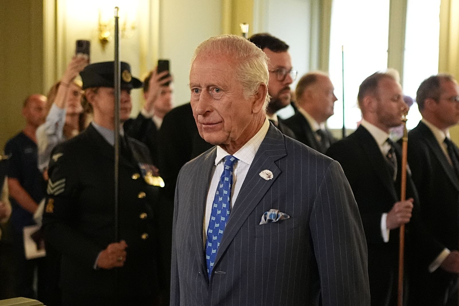 Image may contain Charles Prince of Wales Annie Golden People Person Clothing Coat Accessories Formal Wear and Tie