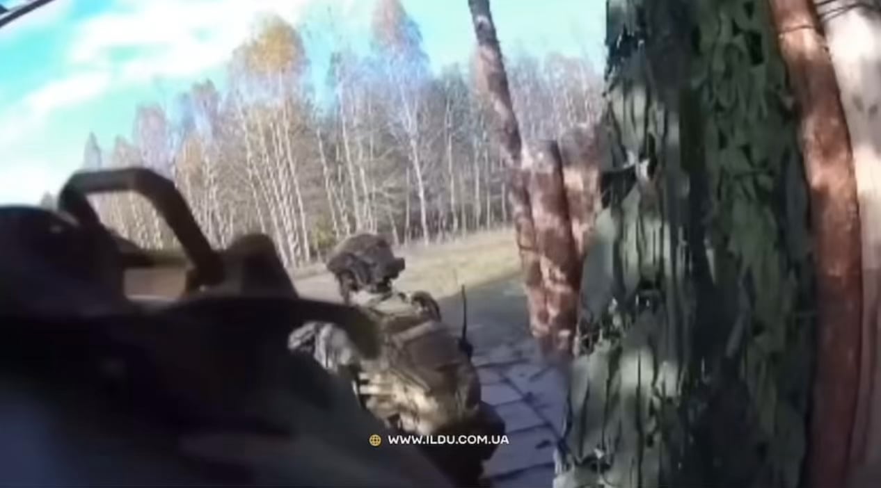 Helmet cam footage of foreign fighters from -omega team during an incursion into Russia/interview with a British  volunteer who fought was part of the raid