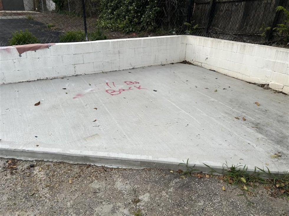 "I'll Be Back" was spray-painted on the ground.