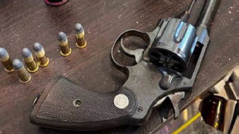 A loaded pistol and ammunition was found during the search warrants.