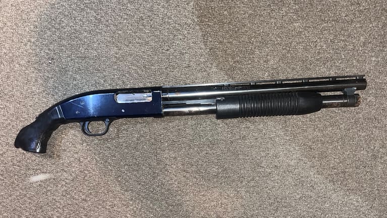 A sawn-off shotgun found during the investigation. 
