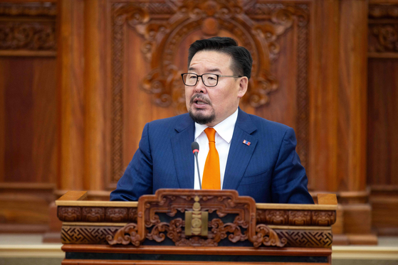 New Mongolian Prime Minister Gombojav Zandanshatar speaks after a vote in parliament in Ulaanbaatar, the capital of Mongolia, on June 13. Mongolian lawmakers on June 13 swore in former top diplomat Gombojav Zandanshatar as the country's new prime minister, after his predecessor resigned following weeks of anti-corruption protests. [AFP/YONHAP]