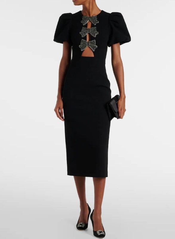 Beatrice wore the 'Eliana puff-sleeve midi dress' by Rebecca Vallance